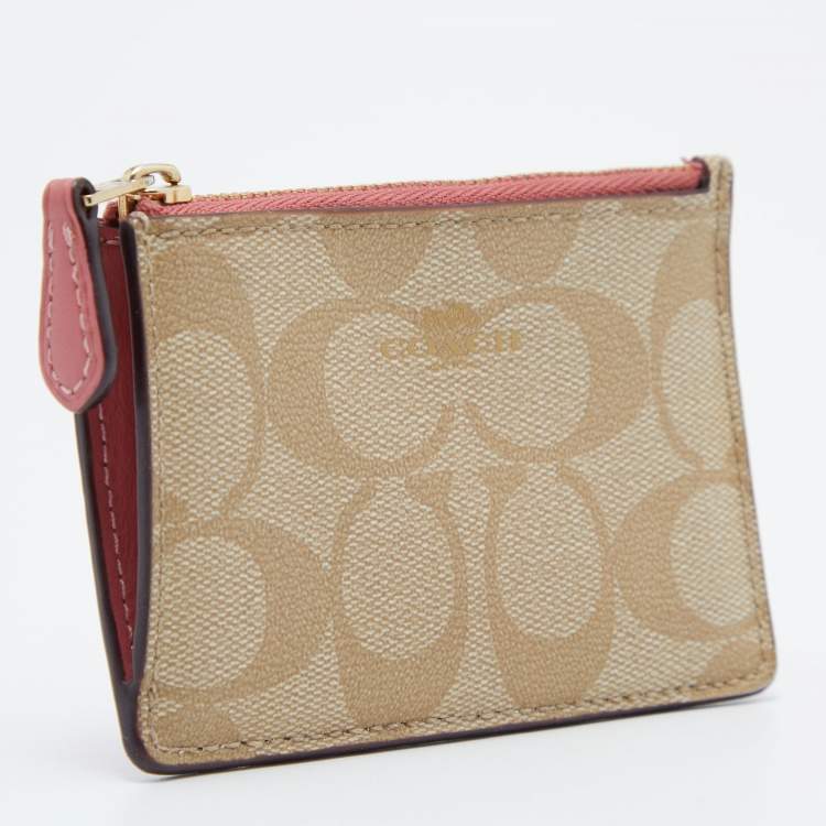 Pre Owned Coach Beige/Pink Signature Coated Canvas and Leather Zip Card Holder