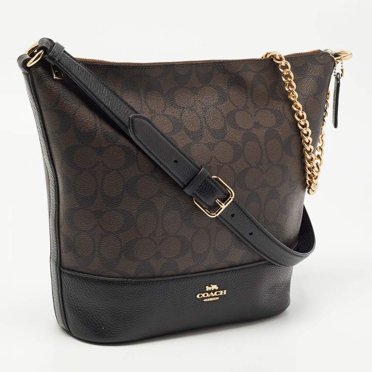Pre Owned Coach Black/Brown Signature Coated Canvas and Leather Medium Paxton Shoulder Bag