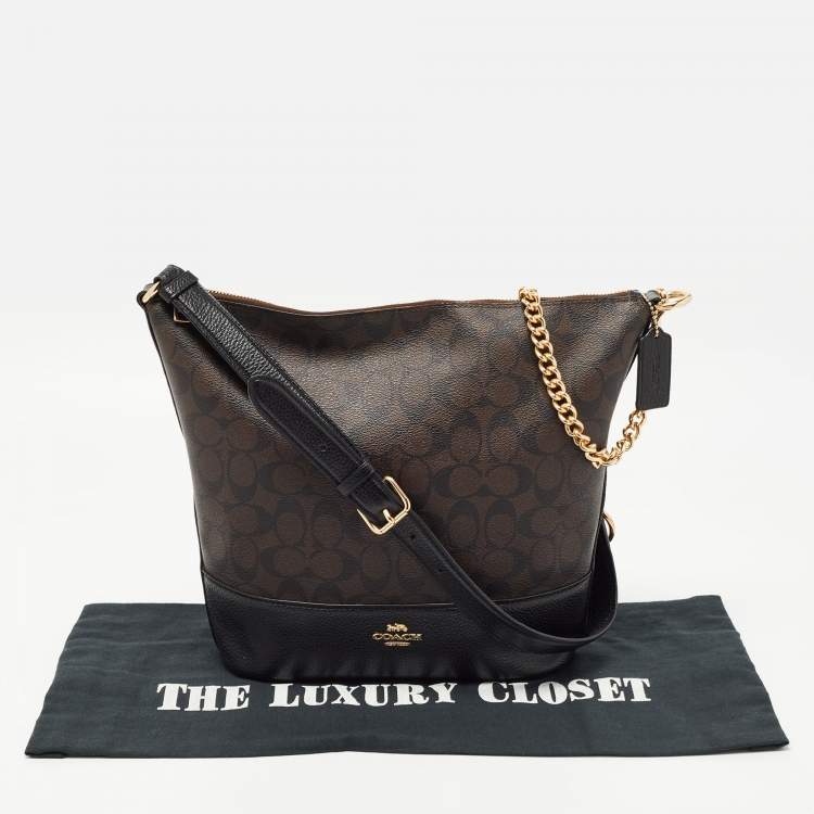 Pre Owned Coach Black/Brown Signature Coated Canvas and Leather Medium Paxton Shoulder Bag