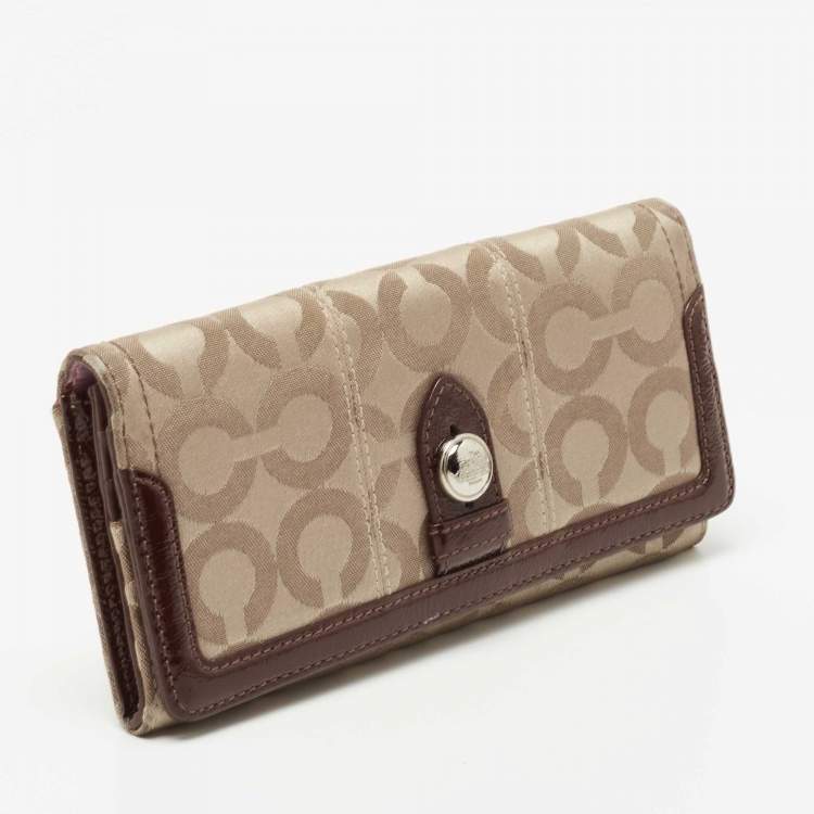 Pre Owned Coach Beige/Brown Signature Canvas and Patent Leather Flap Continental Wallet