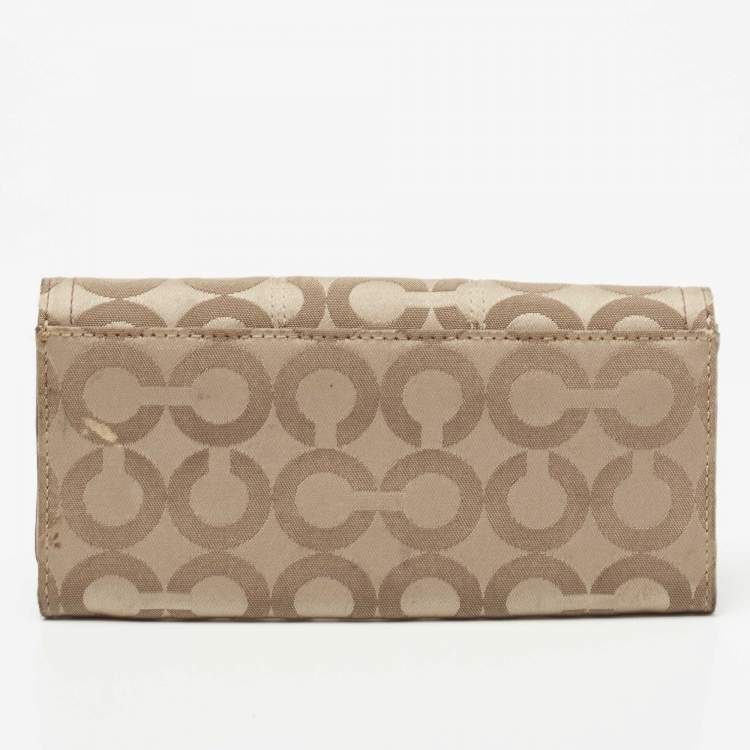 Pre Owned Coach Beige/Brown Signature Canvas and Patent Leather Flap Continental Wallet