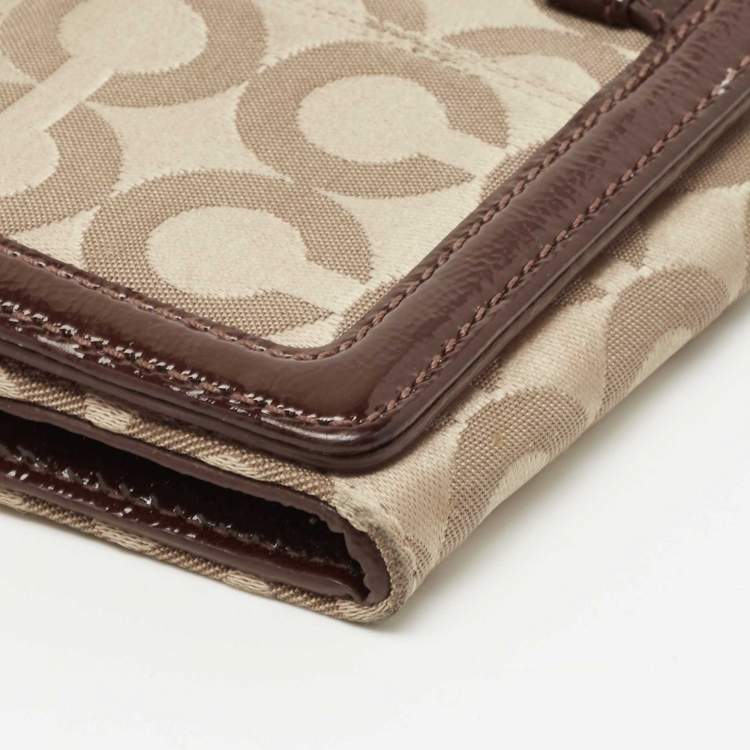 Pre Owned Coach Beige/Brown Signature Canvas and Patent Leather Flap Continental Wallet
