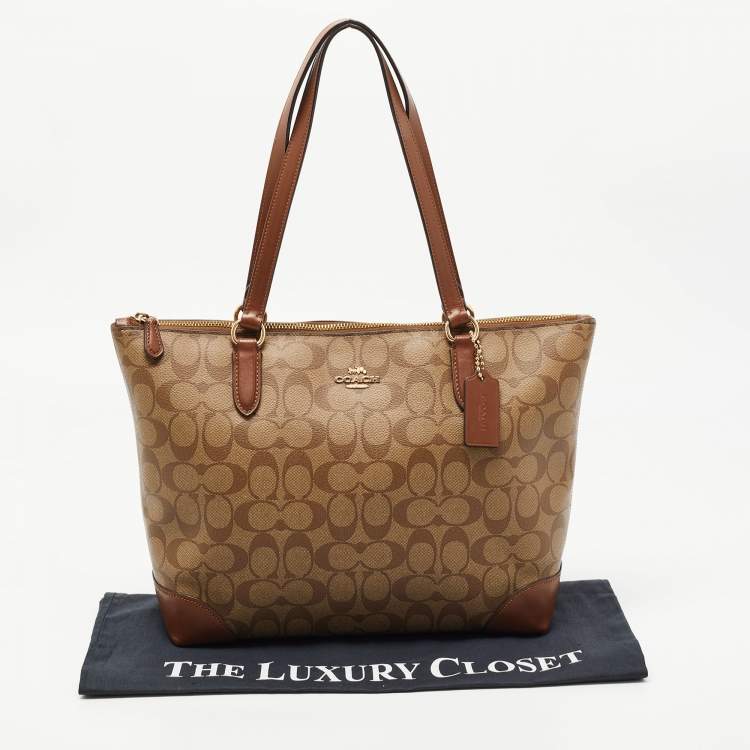 Pre Owned Coach Brown Signature Coated Canvas and Leather Top Zip Tote