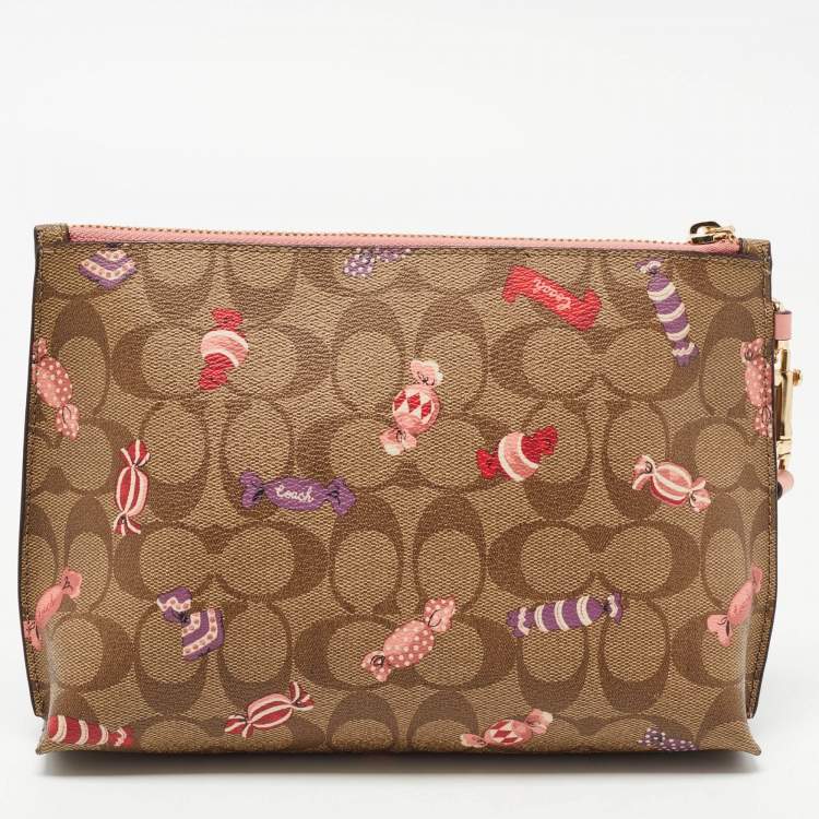 مملوكة مسبقًا Coach Beige Signature Coated Canvas and Leather Rowan Wristlet Pouch