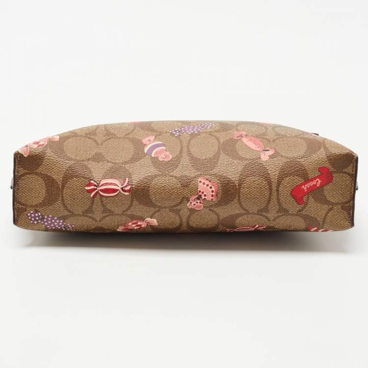 مملوكة مسبقًا Coach Beige Signature Coated Canvas and Leather Rowan Wristlet Pouch