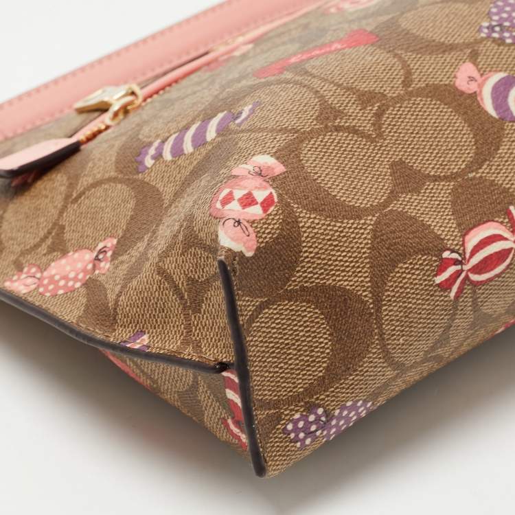 مملوكة مسبقًا Coach Beige Signature Coated Canvas and Leather Rowan Wristlet Pouch
