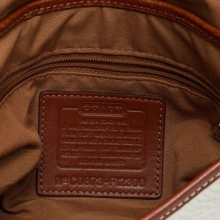 Pre Owned Coach Off White/Brown Leather Soho Baguette Bag