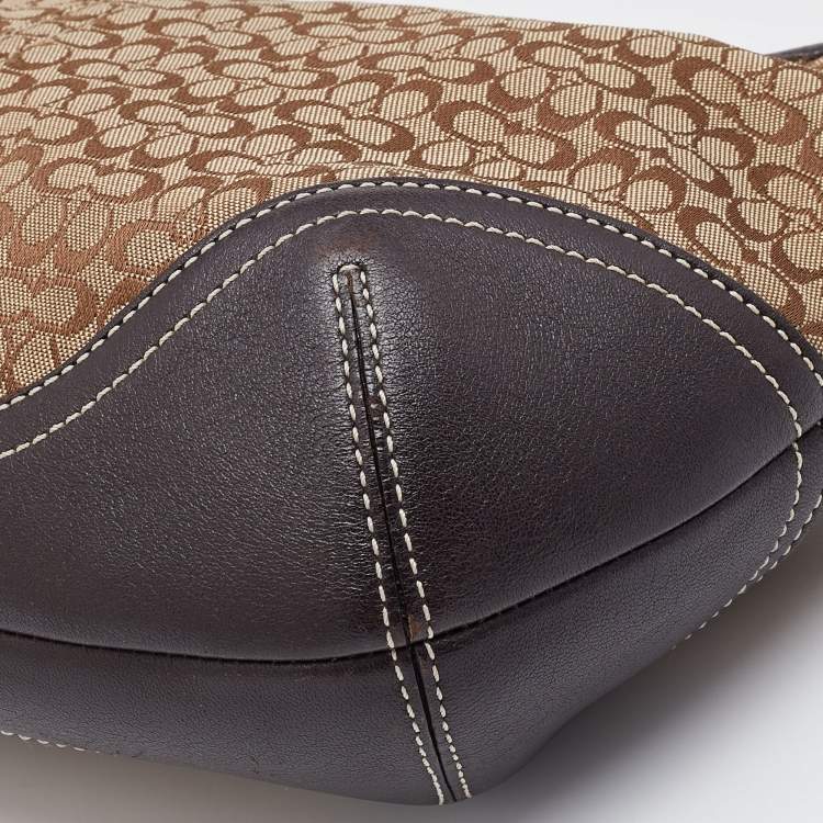 Pre Owned Coach Beige/Brown Signature Canvas and Leather Soho Hobo