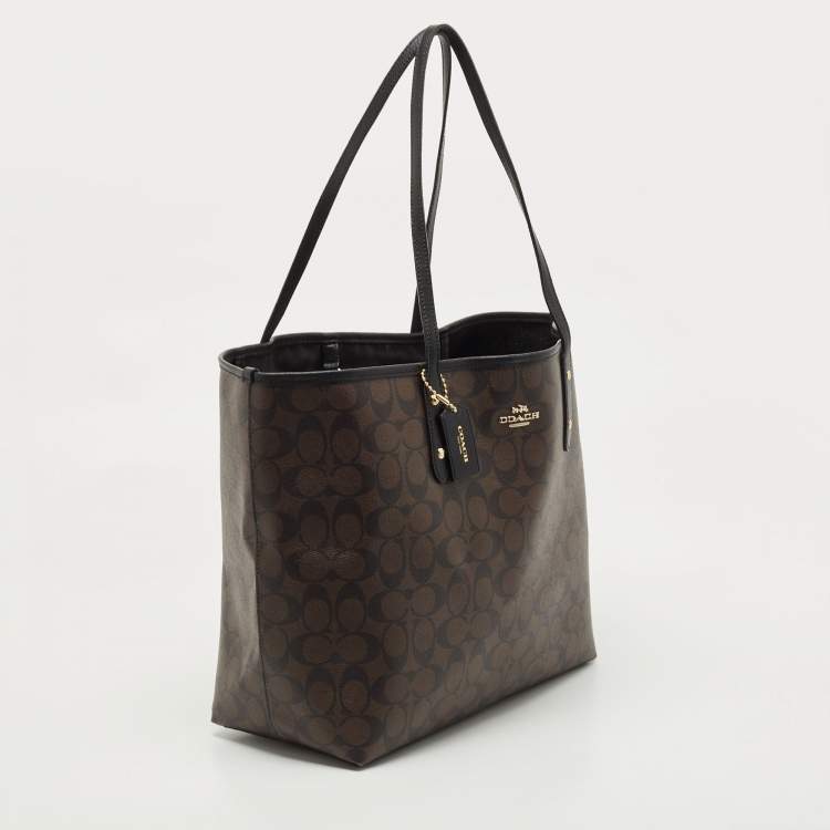Pre Owned Coach Dark Brown Signature Coated Canvas and Leather City Tote