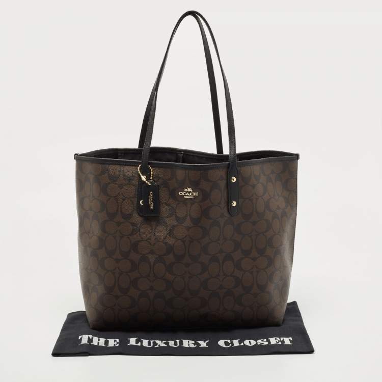 Pre Owned Coach Dark Brown Signature Coated Canvas and Leather City Tote