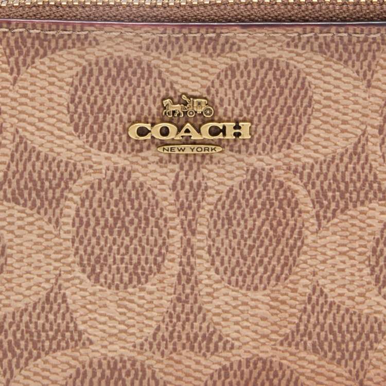 Pre Owned Coach Beige/Brown Signature Coated Canvas and Leather Zip Skinny ID Case