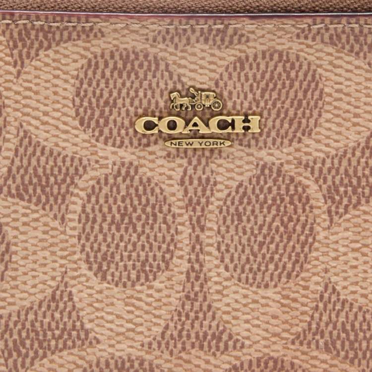 Pre Owned Coach Beige/Brown Signature Coated Canvas and Leather Zip Skinny ID Case