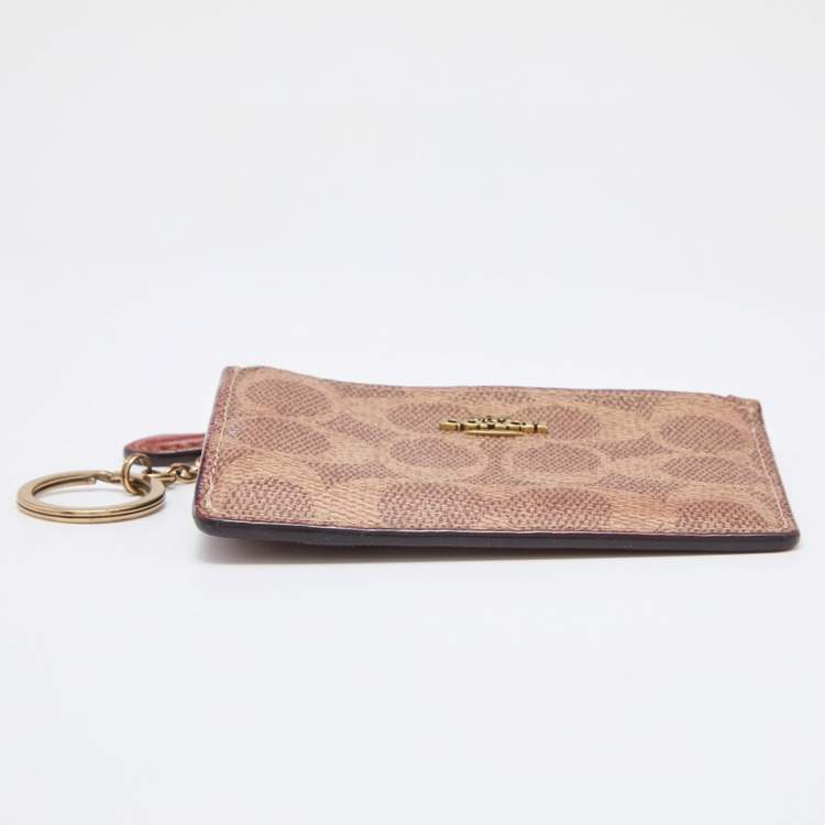 Pre Owned Coach Beige/Brown Signature Coated Canvas and Leather Zip Skinny ID Case