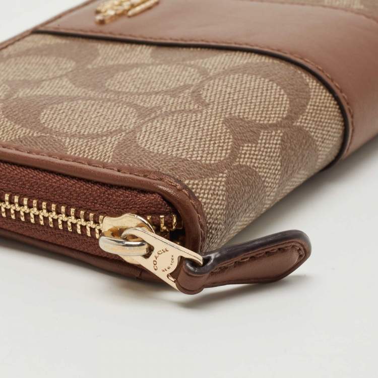 Pre Owned Coach Brown Signature Coated Canvas and Leather Accordion Continental Wallet
