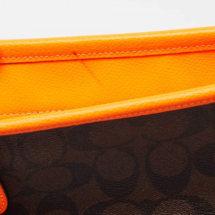 Pre Owned Coach Dark Brown/Neon Signature Coated Canvas and Leather Signature Zip Tote