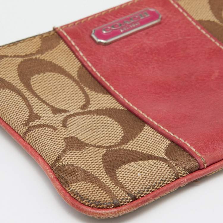 Pre Owned Coach Beige/Pink Signature Canvas and Leather Wristlet Pouch