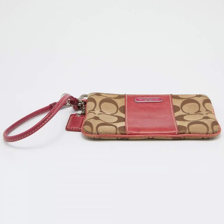 Pre Owned Coach Beige/Pink Signature Canvas and Leather Wristlet Pouch