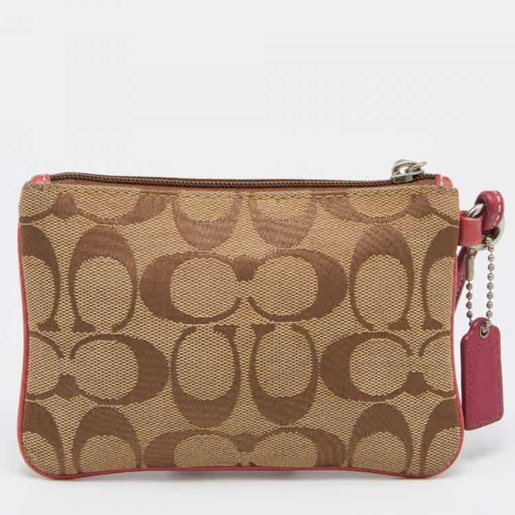 Pre Owned Coach Beige/Pink Signature Canvas and Leather Wristlet Pouch
