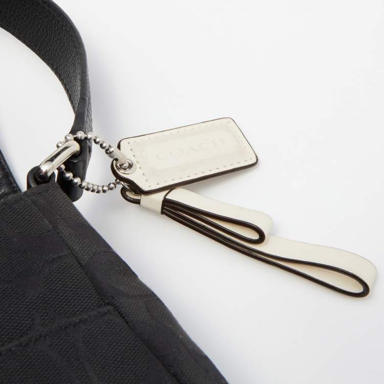 Pre Owned Coach Black Signature Canvas and Leather Park Hobo 
