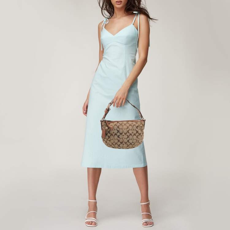 مملوكة مسبقًا Coach Beige/Brown Signature Canvas and Leather Soho Hobo