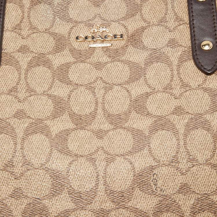 Pre Owned Coach Beige/Brown Signature Coated Canvas and Leather City Zip Tote