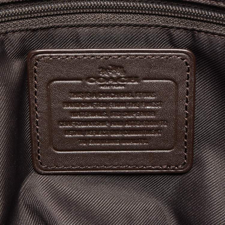 Pre Owned Coach Beige/Brown Signature Coated Canvas and Leather City Zip Tote