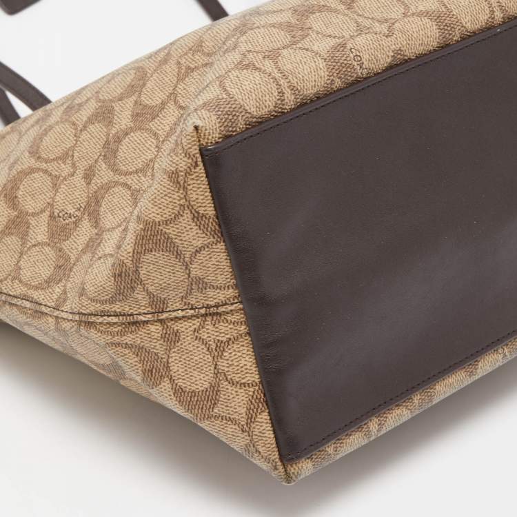 Pre Owned Coach Beige/Brown Signature Coated Canvas and Leather City Zip Tote