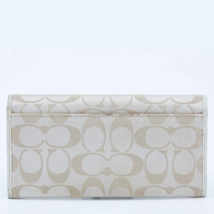 Pre Owned Coach Beige/White Signature Canvas and Leather Flap Continental Wallet