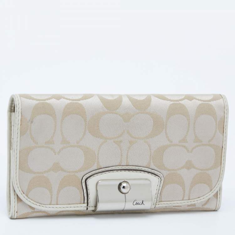Pre Owned Coach Beige/White Signature Canvas and Leather Flap Continental Wallet