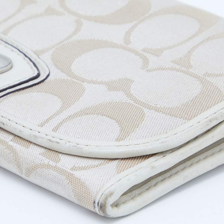 Pre Owned Coach Beige/White Signature Canvas and Leather Flap Continental Wallet