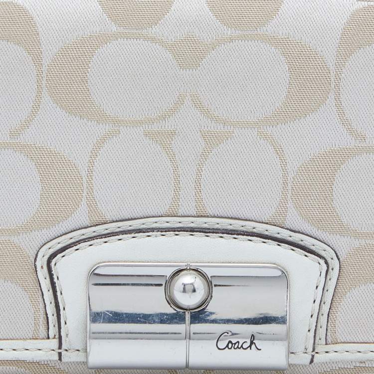 Pre Owned Coach Beige/White Signature Canvas and Leather Flap Continental Wallet