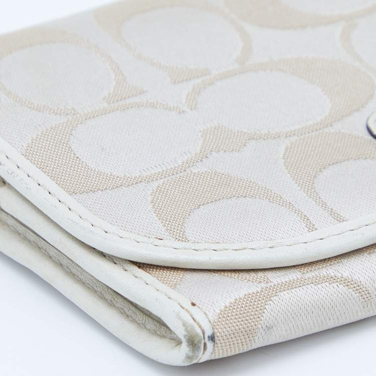 Pre Owned Coach Beige/White Signature Canvas and Leather Flap Continental Wallet
