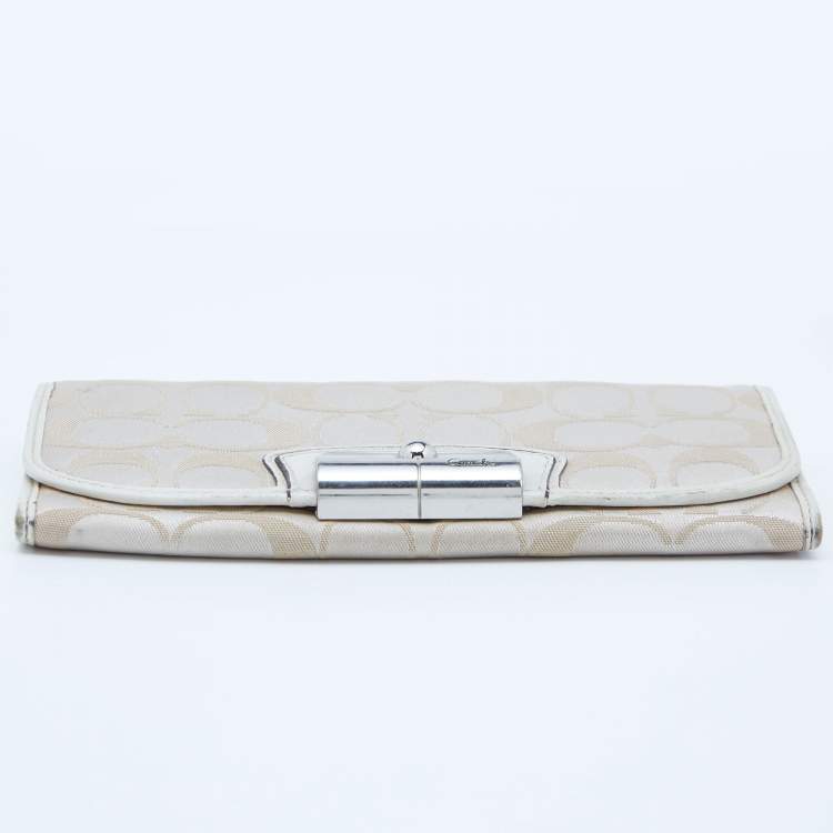 Pre Owned Coach Beige/White Signature Canvas and Leather Flap Continental Wallet