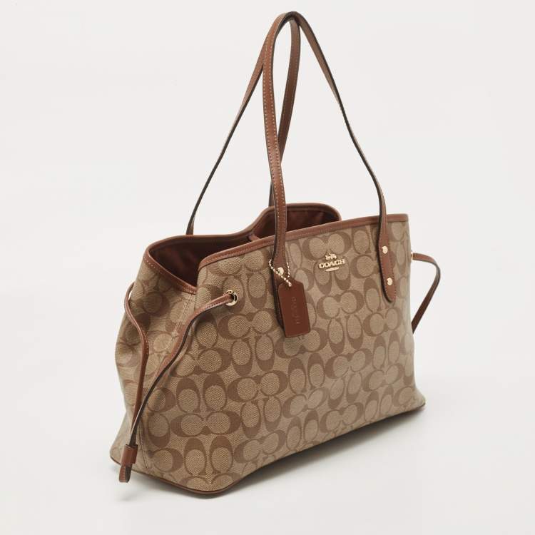 Pre Owned Coach Beige Signature Coated Canvas and Leather Drawstring Carryall Satchel