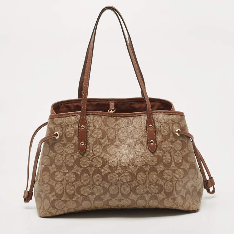 Pre Owned Coach Beige Signature Coated Canvas and Leather Drawstring Carryall Satchel