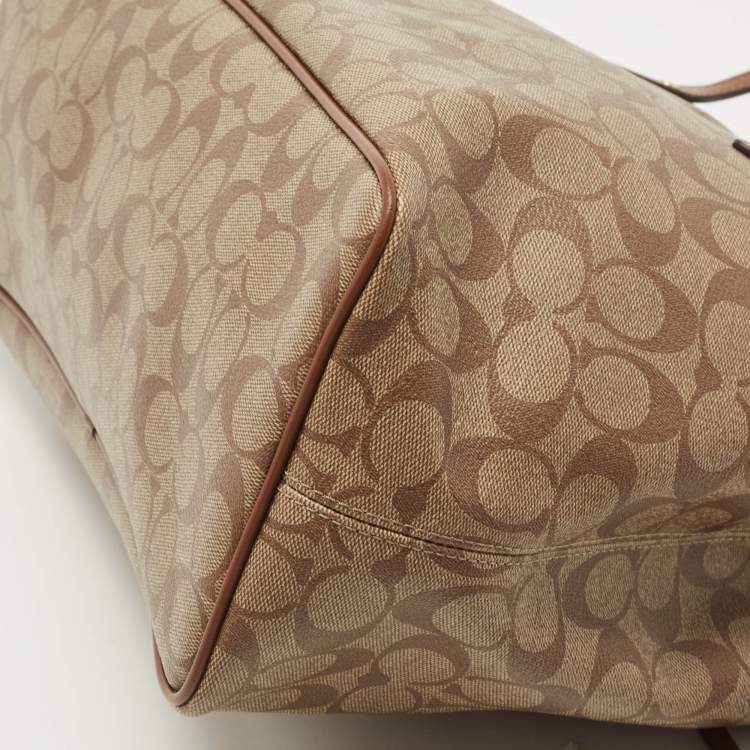 Pre Owned Coach Beige Signature Coated Canvas and Leather Drawstring Carryall Satchel