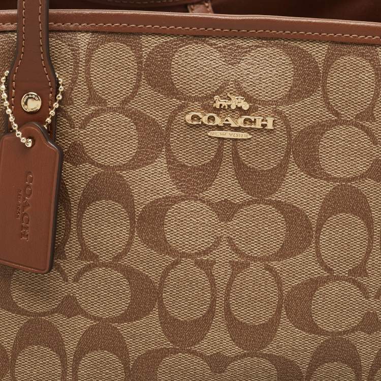 Pre Owned Coach Beige Signature Coated Canvas and Leather Drawstring Carryall Satchel