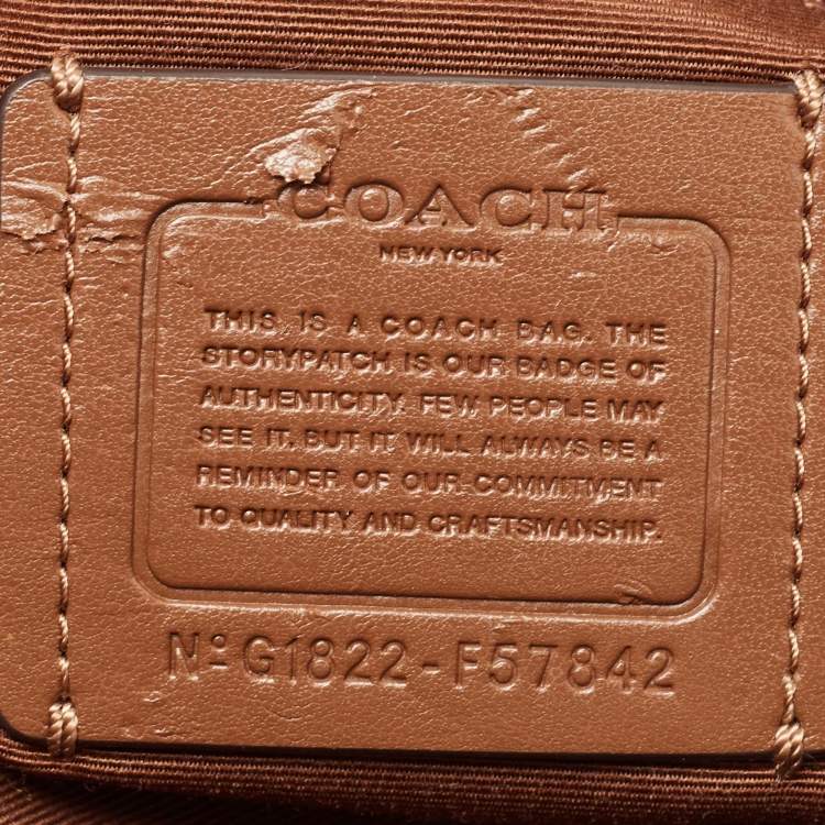 Pre Owned Coach Beige Signature Coated Canvas and Leather Drawstring Carryall Satchel