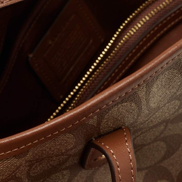 Pre Owned Coach Beige Signature Coated Canvas and Leather Drawstring Carryall Satchel