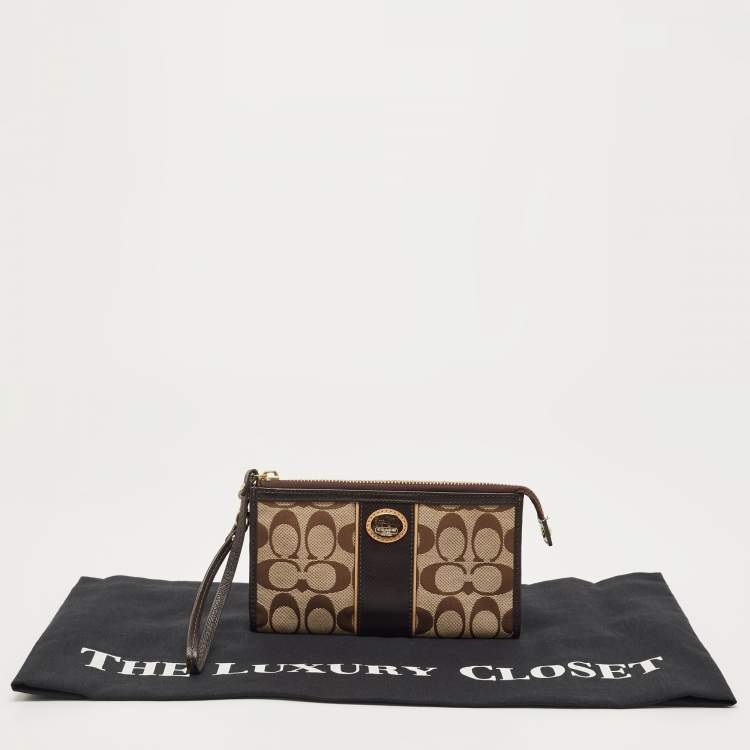 مملوكة مسبقًا Coach Brown/Beige Signature Canvas and Lizard Embossed Leather Zip Wristlet Pouch