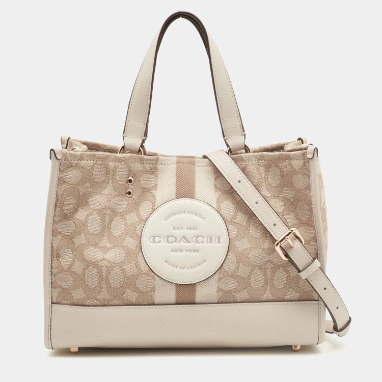 Pre Owned Coach Beige Leather and Canvas Dempsey Carryall Tote