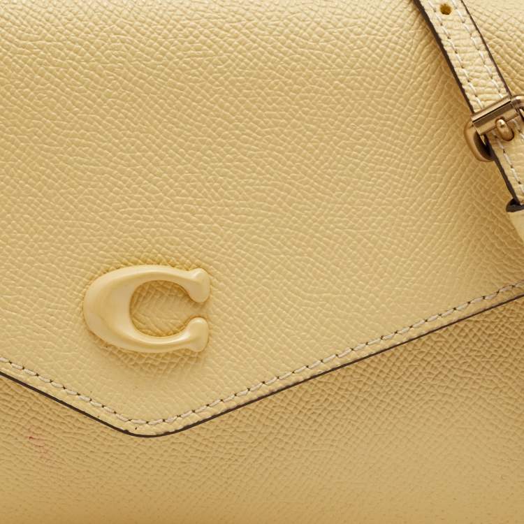 Pre Owned Coach Yellow Leather Wyn Flap Crossbody Bag