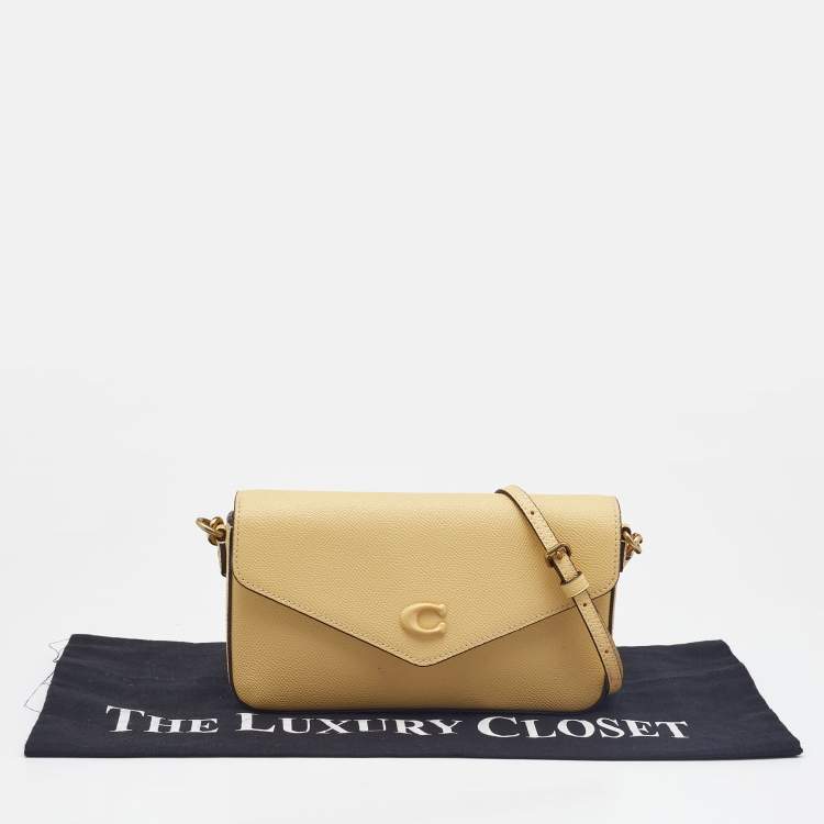 Pre Owned Coach Yellow Leather Wyn Flap Crossbody Bag