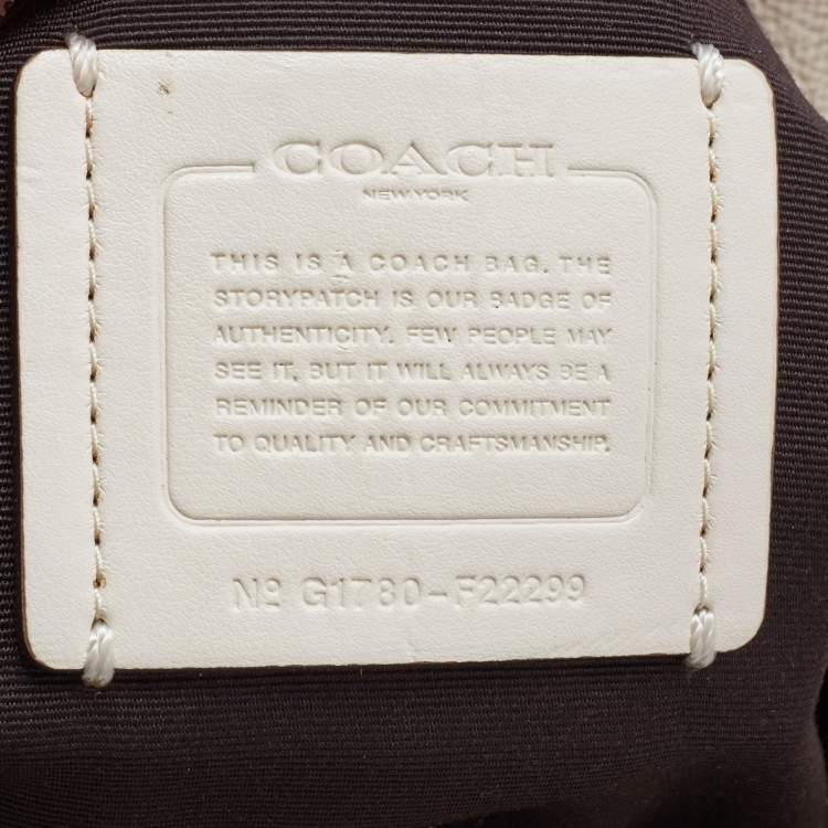 Pre Owned Coach Ivory Leather Stardust Studs City Zip Tote