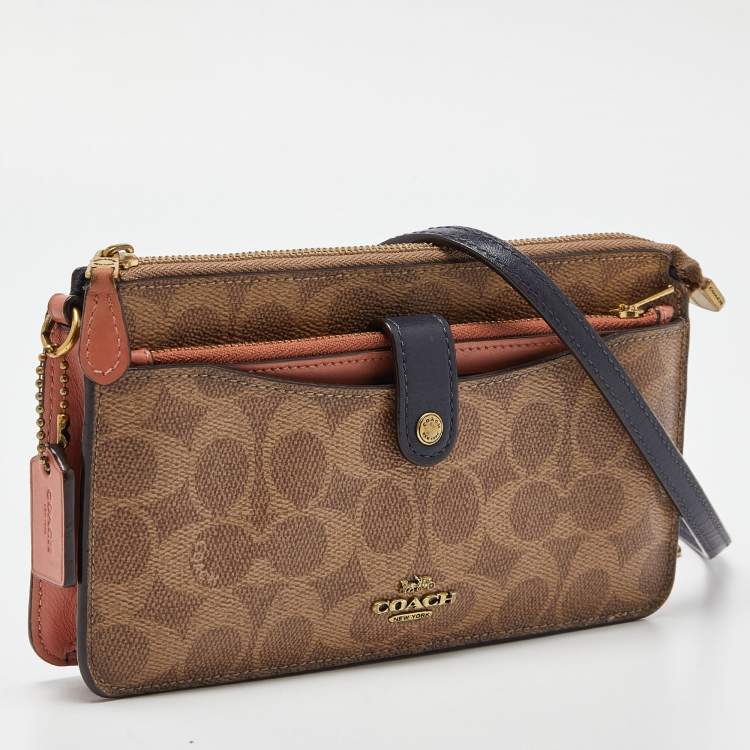 Pre Owned Coach Beige/Peach Signature Coated Canvas and Leather Noa Pop Up Crossbody Bag