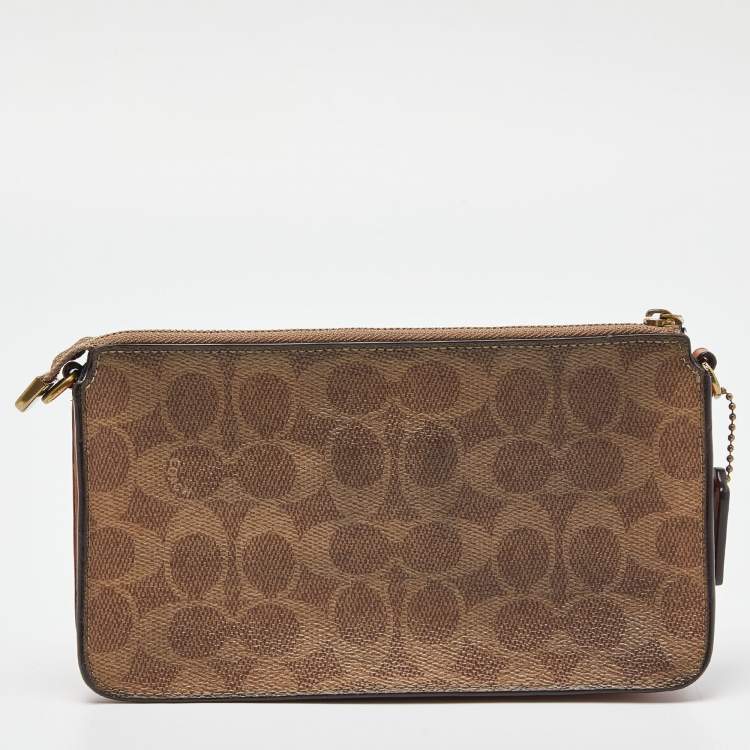 Pre Owned Coach Beige/Peach Signature Coated Canvas and Leather Noa Pop Up Crossbody Bag