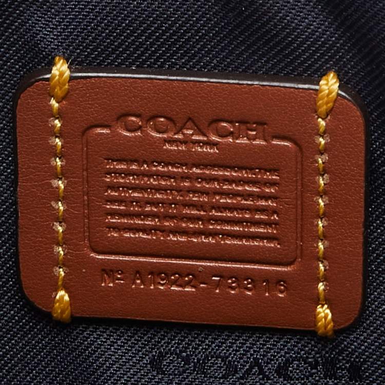 Pre Owned Coach Beige/Peach Signature Coated Canvas and Leather Noa Pop Up Crossbody Bag