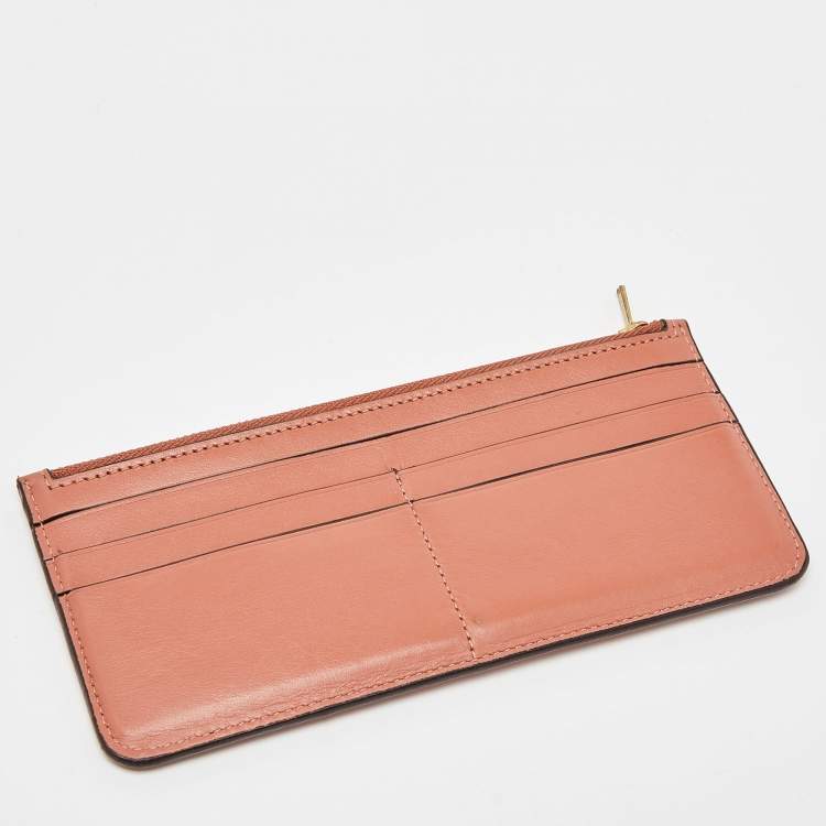 Pre Owned Coach Beige/Peach Signature Coated Canvas and Leather Noa Pop Up Crossbody Bag