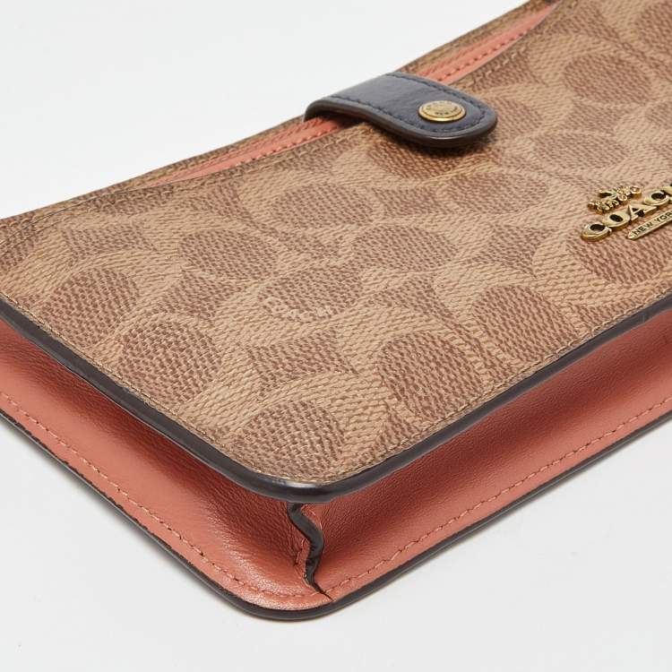 Pre Owned Coach Beige/Peach Signature Coated Canvas and Leather Noa Pop Up Crossbody Bag