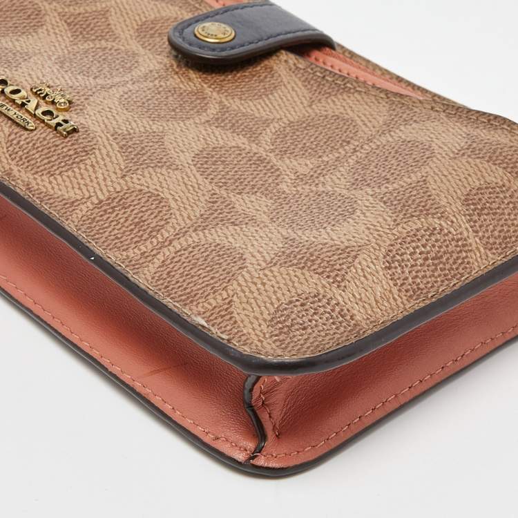 Pre Owned Coach Beige/Peach Signature Coated Canvas and Leather Noa Pop Up Crossbody Bag